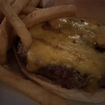 Olde Village Inne - Close up of my cheeseburger (sorry for the lighting) - American Near Me - Nyack, New York