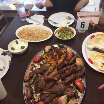 Ali Baba Mediterranean Grill - Family party platter comes with rice and 2 sides - Mediterranean Near Me - Memphis, Tennessee Ali Baba Mediterranean Grill - Family party platter comes with rice and 2 sides - Mediterranean Near Me - Memphis, Tennessee