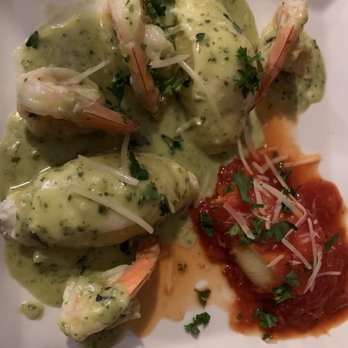 Ellinya Italian - Stuffed shells and shrimp with pesto cream and marinara sauce - Italian Near Me - Corsicana, Texas Ellinya Italian - Stuffed shells and shrimp with pesto cream and marinara sauce - Italian Near Me - Corsicana, Texas