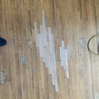 Omar's Hardwood Floors - a wooden floor with a hole in it - Flooring Near Me Omar's Hardwood Floors - a wooden floor with a hole in it - Flooring Near Me