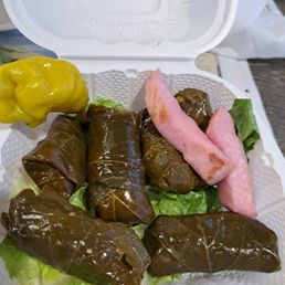 Grapeleaves. IDK what those ham strip lookin things are.