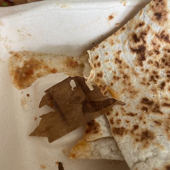 Chipotle Mexican Grill - Burnt paper with my flat all tortilla quesadilla with no cheese! Paper thin hard as a rock not enjoyable at all. - Fast Food Near Me - Marina, California Chipotle Mexican Grill - Burnt paper with my flat all tortilla quesadilla with no cheese! Paper thin hard as a rock not enjoyable at all. - Fast Food Near Me - Marina, California