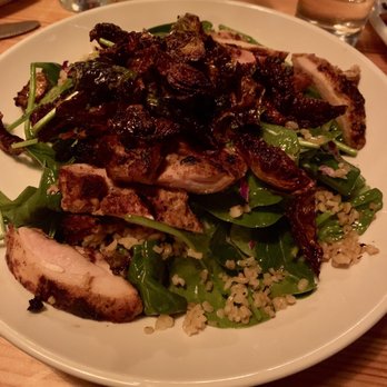 Sutton's - Warm Winter Salad (with Moroccan chicken): toasted bulgar, arugula, cabbage, fried Brussels sprouts, toasted almonds, with tahini dressing - American Near Me - Philadelphia, Pennsylvania Sutton's - Warm Winter Salad (with Moroccan chicken): toasted bulgar, arugula, cabbage, fried Brussels sprouts, toasted almonds, with tahini dressing - American Near Me - Philadelphia, Pennsylvania