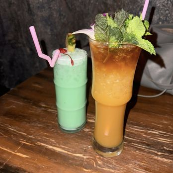The Lost Inferno - Our drinks!!! The one in the left is the blue Astoria. It was sweet and delicious!!! The other one is a strong rum drink. - Tiki Bars Near Me - San Clemente, California The Lost Inferno - Our drinks!!! The one in the left is the blue Astoria. It was sweet and delicious!!! The other one is a strong rum drink. - Tiki Bars Near Me - San Clemente, California