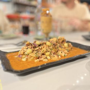 Taipa Peruvian Restaurant- Coral Gables - This is a causa with octopus meat. - Peruvian Near Me - Miami, Florida Taipa Peruvian Restaurant- Coral Gables - This is a causa with octopus meat. - Peruvian Near Me - Miami, Florida