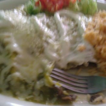 Taqueria Olgys - Beef enchiladas with salsa verde, rice and beans. I did not eat that stuff behind the real food. Lettuce? Bah! - Mexican Near Me - Pensacola, Florida Taqueria Olgys - Beef enchiladas with salsa verde, rice and beans. I did not eat that stuff behind the real food. Lettuce? Bah! - Mexican Near Me - Pensacola, Florida