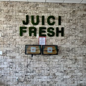 Juici Patties - Side wall - Caribbean Near Me - Sunrise, Florida