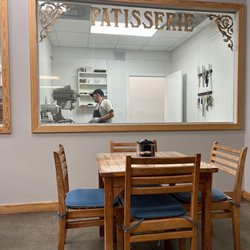 La Parisienne Bakery - Watching the pastries being made. You can see how clean the space is. The tarts are beautiful and taste so good.