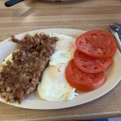 Breakfast House - Eggs over easy , corned beef hash, sliced tomatoes