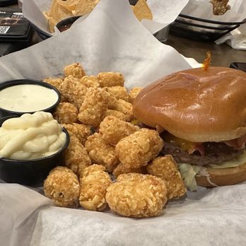 The Brass Tap - All All-American Pub burger with a side of tator tots - Cocktail Bars Near Me - Rocklin, California The Brass Tap - All All-American Pub burger with a side of tator tots - Cocktail Bars Near Me - Rocklin, California