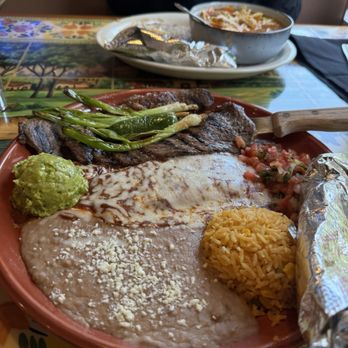 Emiliano's Mexican Restaurant - Carne asada plate with enchilada - Mexican Near Me - San Diego, California Emiliano's Mexican Restaurant - Carne asada plate with enchilada - Mexican Near Me - San Diego, California