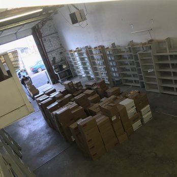 Reno Tahoe Movers - One of the huge piles of heavy boxes the movers brought to the warehouse. - Movers Near Me