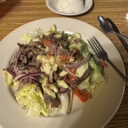 Tiger Of Thailand - Spicy beef salad with a side of steamed ice