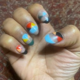 Thou did an amazing job on my nails. I refuse to go any where else and I'm very thankful I found this hidden gem.