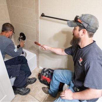 TNT Air Conditioning Heating and Plumbing - Firestone - Alex and David repairing a shower faucet - Plumbing Near Me - Longmont, Colorado TNT Air Conditioning Heating and Plumbing - Firestone - Alex and David repairing a shower faucet - Plumbing Near Me - Longmont, Colorado
