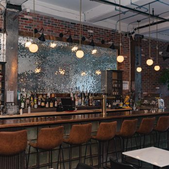 Pitanga - a bar with a lot of chairs - Comfort Food Near Me - Brooklyn, New York