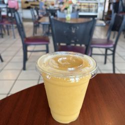 Brewed Awakenings Cafe - Small peach mango smoothie ($5.30 not including tip). Very tasty and refreshing!!