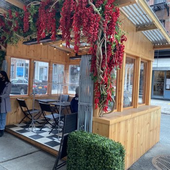 Rubirosa - Outside built on street. - Italian Near Me - New York, New York Rubirosa - Outside built on street. - Italian Near Me - New York, New York