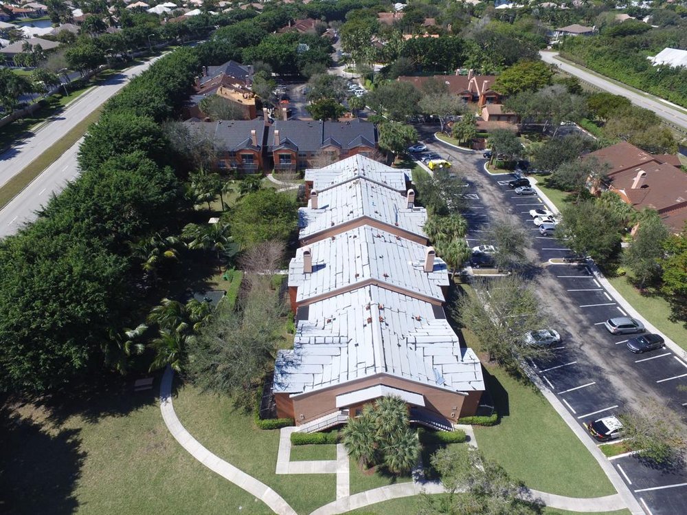 Slide of CSC South Florida Roofing and Asphalt Experts