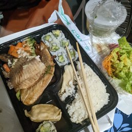 Salmon teriyaki dinner with California roll, 2 pc gyoza, house salad, and miso Salmon teriyaki dinner with California roll, 2 pc gyoza, house salad, and miso
