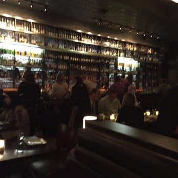 Jack Rose Dining Saloon - Wall of whiskey, 2014 bottles - American Near Me - Washington, DC, District of Columbia