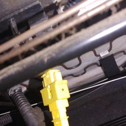 Masters Car Stereo & Tint - Yellow connector unattached the clip-holder (black thing above and to the left )