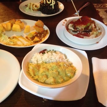 Catalina - Chicken with curry and rice (bottom) Split 4 tapas between two, very good portions. - Tapas Bars Near Me - Seville, SE Catalina - Chicken with curry and rice (bottom) Split 4 tapas between two, very good portions. - Tapas Bars Near Me - Seville, SE