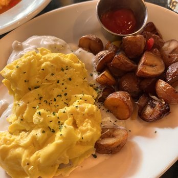 Virginia Inn - Biscuits and gravy with an egg on top. - Bars Near Me - Seattle, Washington Virginia Inn - Biscuits and gravy with an egg on top. - Bars Near Me - Seattle, Washington