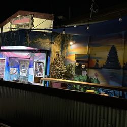 Cambodian Street Food - Front of restaurant at night from street corner