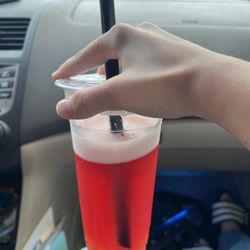 SipPinTea - Strawberry fruit tea with mango popping boba.