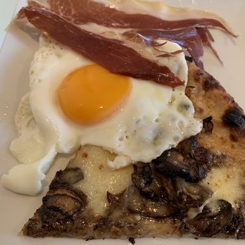 Follia - I added my egg and bacon over the left over mushroom pizza - Wine Bars Near Me - New York, New York