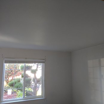 Acoustical Drywall Services - Smooth, textured, primed ceiling after "popcorn" removal - Drywall Installation & Repair Near Me - Pleasanton, California