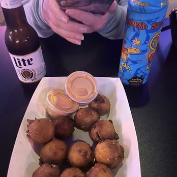 Voodoo Queen Daiquiri Dive - Hush puppies with corn and jalapeño Dipping sauce is really good - Cocktail Bars Near Me - Houston, Texas Voodoo Queen Daiquiri Dive - Hush puppies with corn and jalapeño Dipping sauce is really good - Cocktail Bars Near Me - Houston, Texas