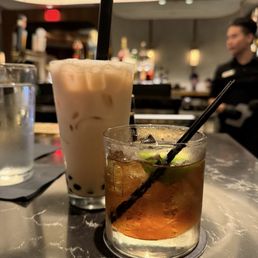 Honey Milk Tea with Boba and a coke with Captain Morgan and a squeeze of lime Honey Milk Tea with Boba and a coke with Captain Morgan and a squeeze of lime