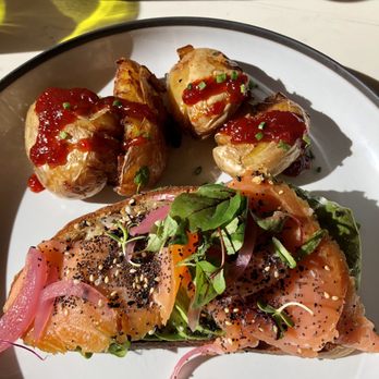 Olive & Hay - Avocado toast with smoked salmon, pickled red onion, and smashed potatoes - Italian Near Me - Napa, California Olive & Hay - Avocado toast with smoked salmon, pickled red onion, and smashed potatoes - Italian Near Me - Napa, California