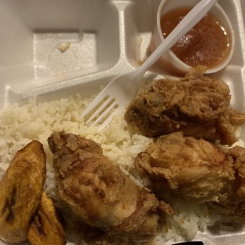Fried Chicken with the Sauce - a fork and rice in a styrofoam container - Caribbean Near Me - Brooklyn, New York
