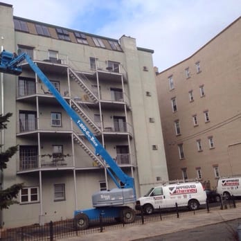 Approved Chimney - Installing an external chimney for apartment complex. - Fireplace Services Near Me - South Hackensack, New Jersey