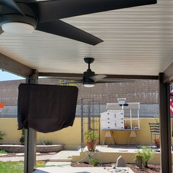 So Cal Contractors & Remodeling - New patio in a dark brown color and ceiling fans, light fixtures and TV mounted. - Patio Coverings Near Me - Orange, California So Cal Contractors & Remodeling - New patio in a dark brown color and ceiling fans, light fixtures and TV mounted. - Patio Coverings Near Me - Orange, California