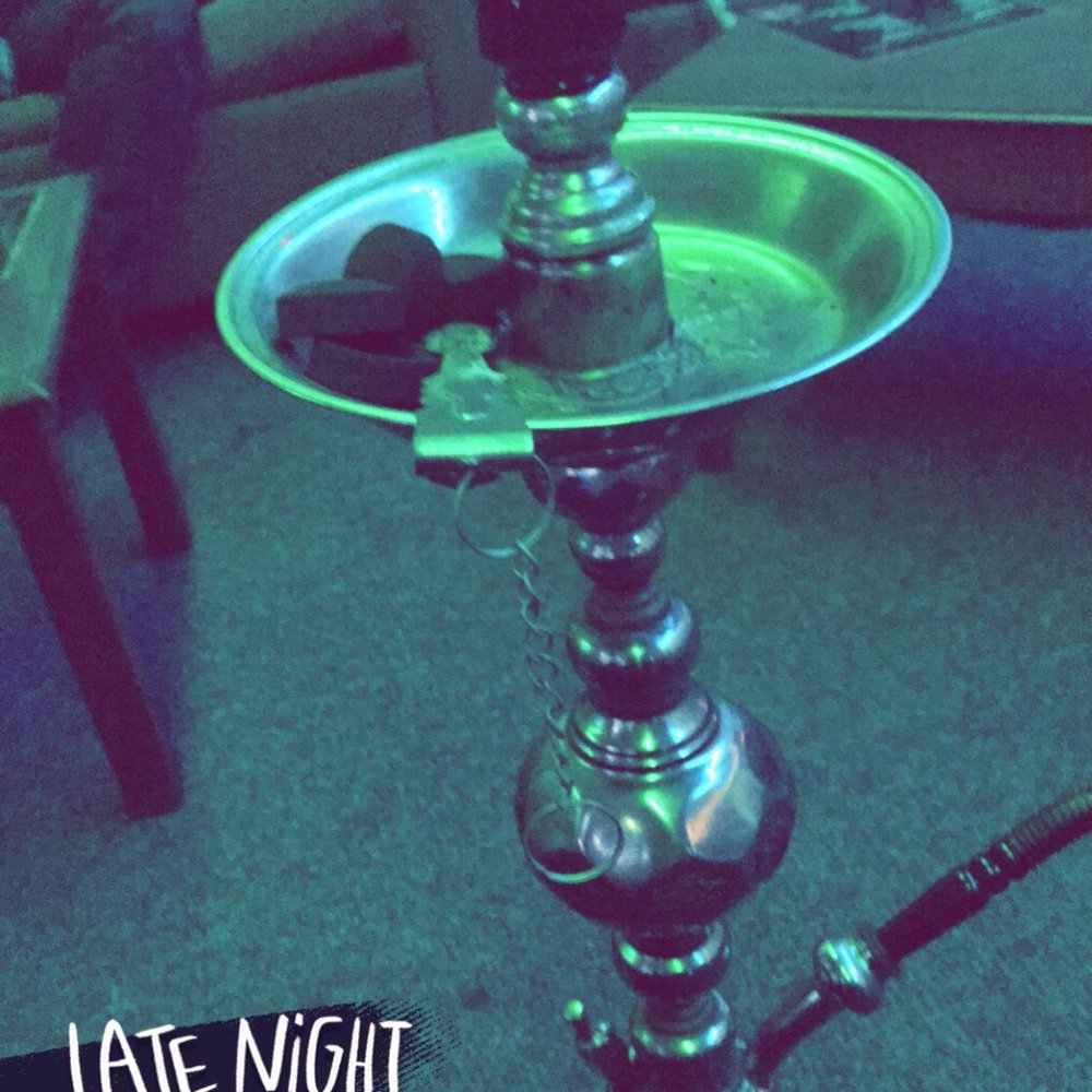 Cleo's Hookah Lounge - a hookah sitting on a table - Hookah Bars Near Me - Canton, Ohio Cleo's Hookah Lounge - a hookah sitting on a table - Hookah Bars Near Me - Canton, Ohio