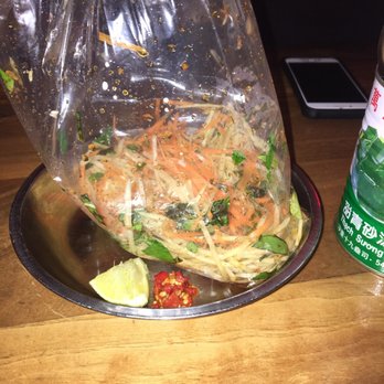 Le Red Tiger - This is a papaya and other greens salad. It's in a bag with a dressing. This was like the best thing on the menu. - Vietnamese Near Me - Montreal, Quebec