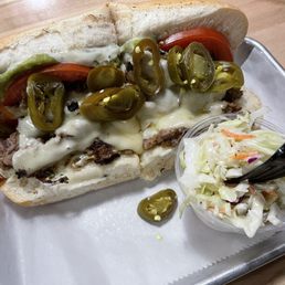 Psycho Cheesesteak with coleslaw side Psycho Cheesesteak with coleslaw side