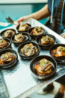 Intimate Gourmet Events - I have taken a circuitous journey in and out of, and ultimately back to the kitchen. In my early years, while I was honing my acting chops in New York City, I supplemented commercial and TV work with cooking stints for luminaries such as Wylie Dufresne (71 Fresh Food, WD-50) and Laurent Tourondel (BLT Fish, BLT Steak). And when I wasn’t working, I was eating my way through New York City. I ate everything, everywhere, and often. I would eat a dish, write down the menu description, and then go home and re-create it on my own. This process of formal training with a deep desire to follow my unique palate allowed me to develop a vast array of techniques and styles as a chef. I’m not a slave to formal training or a particular style of food, which has allowed me to develop a cooking craft that intuitively guides me. When I am cooking, I lose the sense of time, my worries erode into a sauce and I find myself, knife in hand, in the eternal moment. I hope you join me on this journey by tasting the world through my cooking! Intimate Gourmet Events - I have taken a circuitous journey in and out of, and ultimately back to the kitchen. In my early years, while I was honing my acting chops in New York City, I supplemented commercial and TV work with cooking stints for luminaries such as Wylie Dufresne (71 Fresh Food, WD-50) and Laurent Tourondel (BLT Fish, BLT Steak). And when I wasn’t working, I was eating my way through New York City. I ate everything, everywhere, and often. I would eat a dish, write down the menu description, and then go home and re-create it on my own. This process of formal training with a deep desire to follow my unique palate allowed me to develop a vast array of techniques and styles as a chef. I’m not a slave to formal training or a particular style of food, which has allowed me to develop a cooking craft that intuitively guides me. When I am cooking, I lose the sense of time, my worries erode into a sauce and I find myself, knife in hand, in the eternal moment. I hope you join me on this journey by tasting the world through my cooking!