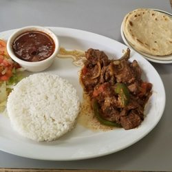 La Frontera Market & Deli - Stewed Chuck steak served with rice and beans ( Carne Guisada con arroz y frijoles )