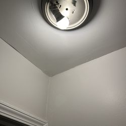 Lumos Real Estate - A light that kept going out had no cover and the other bulb was completely missing.