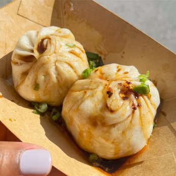 Smorgasburg - Regular and Spicy Pork Bao @ Destination Dumplings - Street Vendors Near Me - Brooklyn, New York Smorgasburg - Regular and Spicy Pork Bao @ Destination Dumplings - Street Vendors Near Me - Brooklyn, New York
