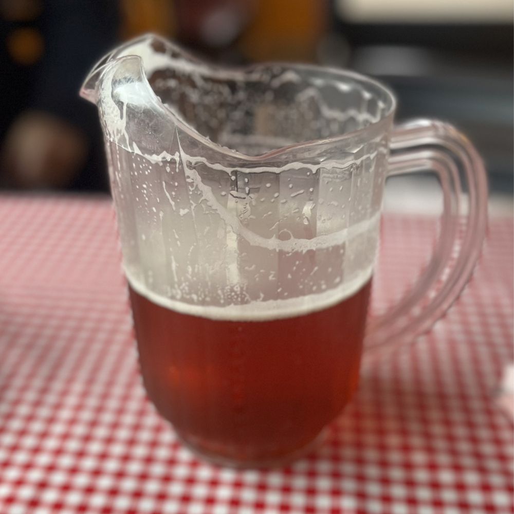 La Siciliana - a pitcher of tea on a table - Pizza Near Me - Willits, California La Siciliana - a pitcher of tea on a table - Pizza Near Me - Willits, California
