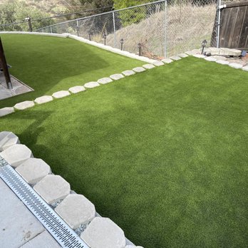 Coronado Turf - I love how they fit the turf in between the retaining wall blocks! - Artificial Turf Near Me