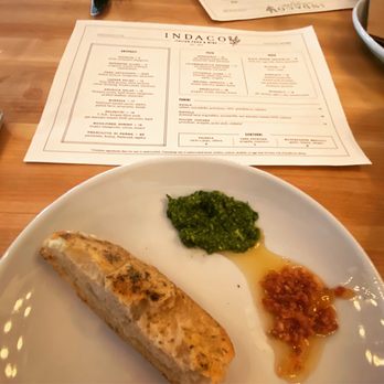 Indaco - Focaccia with pesto and a garlic prosciutto mix! - Italian Near Me - Charlotte, North Carolina Indaco - Focaccia with pesto and a garlic prosciutto mix! - Italian Near Me - Charlotte, North Carolina