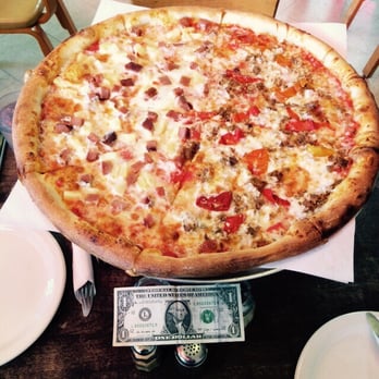 Proletariat Pizza - Look at how big it is compare to the dollar bill!! - Pizza Near Me - Seattle, Washington