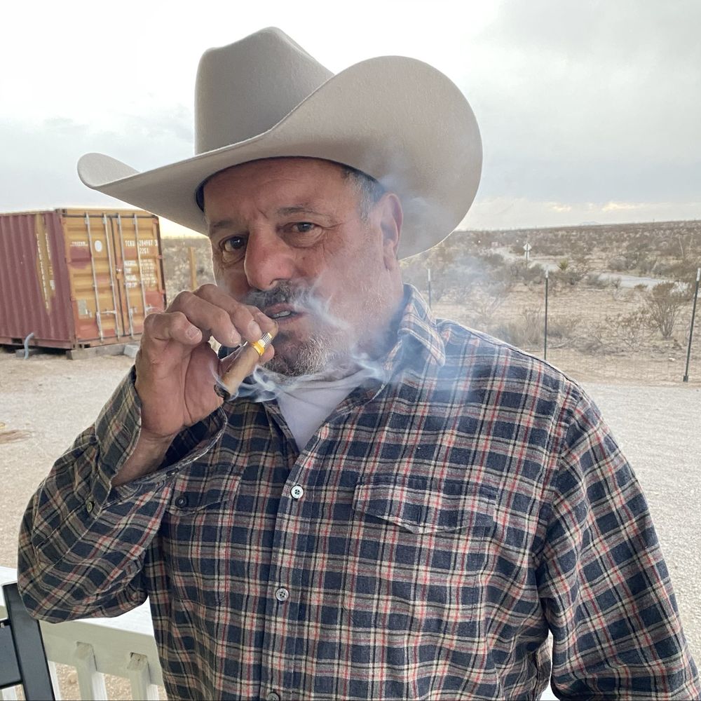 Starr Western Wear - El Capitan Gustavo enjoying his Cuban cigar and new cowboy hat! - Men's Clothing Near Me - El Paso, Texas Starr Western Wear - El Capitan Gustavo enjoying his Cuban cigar and new cowboy hat! - Men's Clothing Near Me - El Paso, Texas